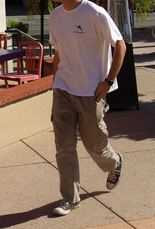 A San Luis Obispo Resident, wearing a white t-shirt and brown cargo pants. Photo by: Alena Stanley